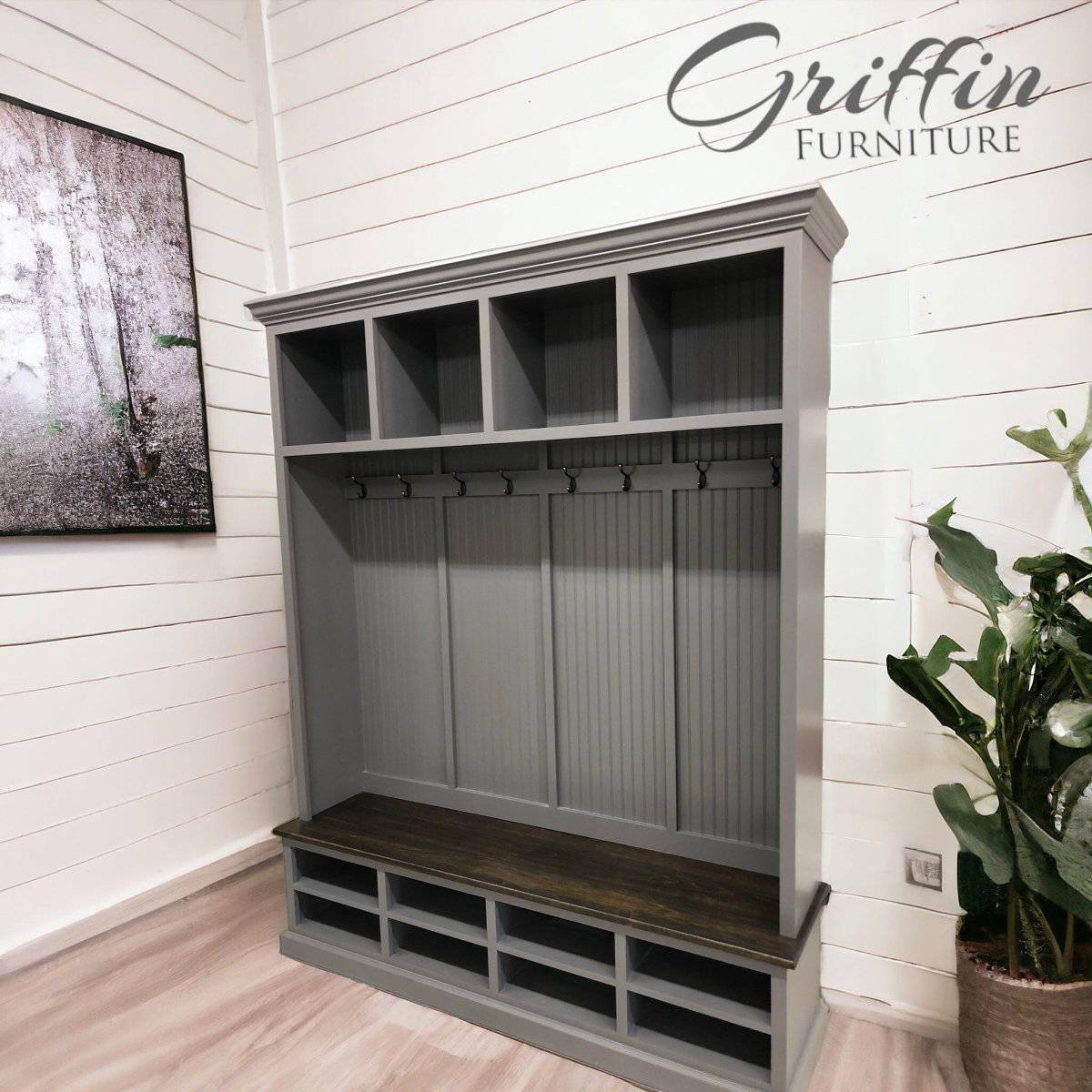 Elegant mudroom coat rack providing stylish organization for coats and accessories in an entryway.