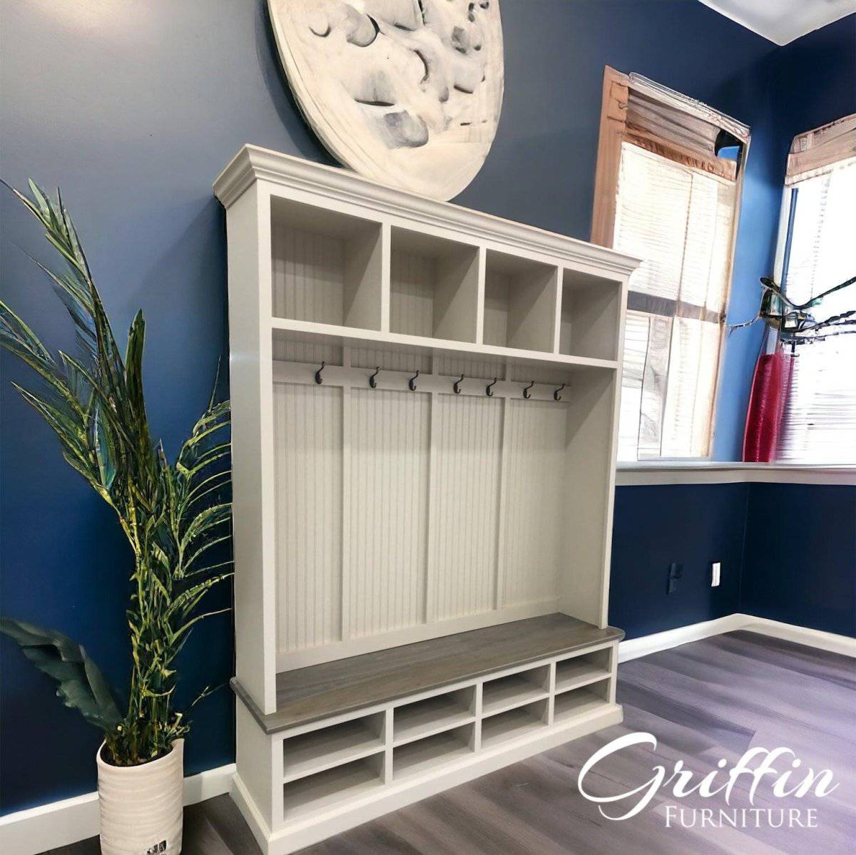Elegant mudroom coat rack providing stylish organization for coats and accessories in an entryway.