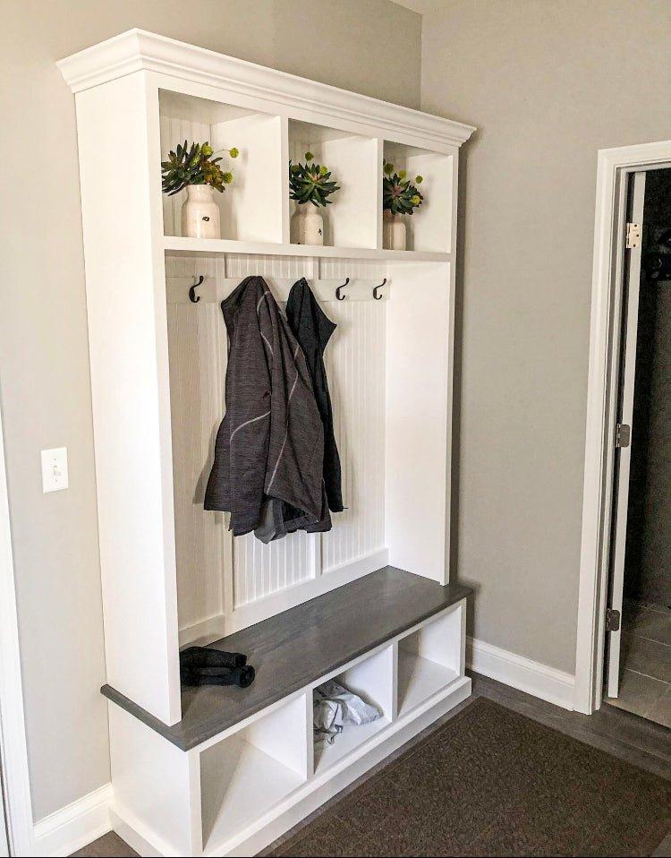 Elegant entryway storage bench providing functional organization and stylish decor for your home.